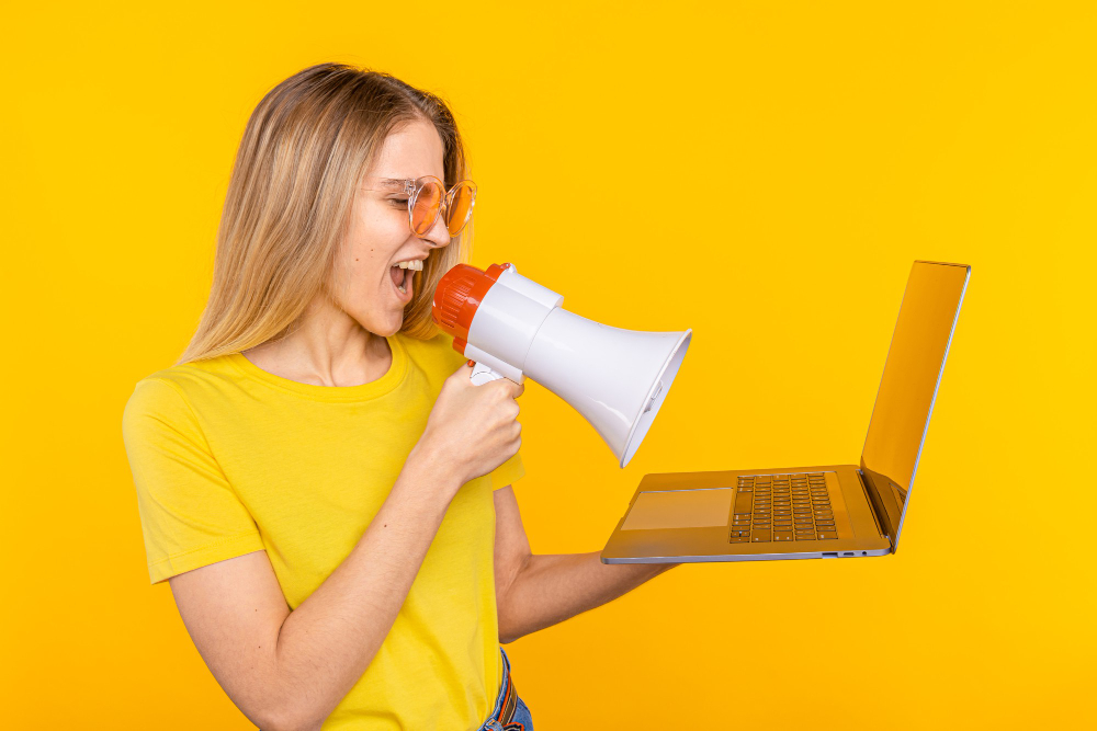 Social Media Ad Manager with Laptop and Speaker